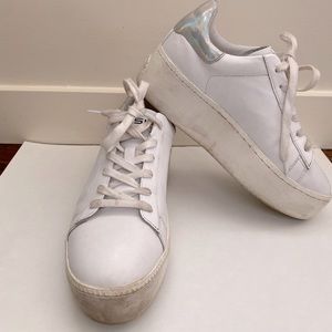 Women’s Ash white platform sneakers with holographic detail on heel. Size 8.